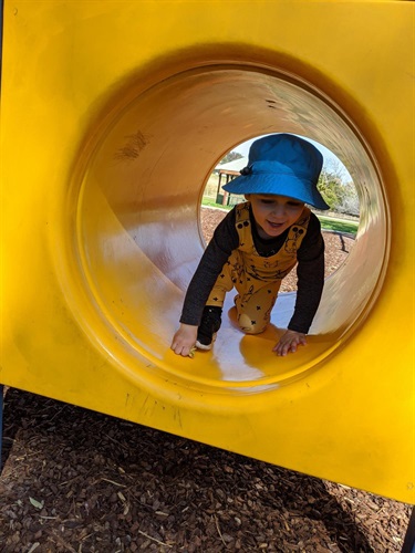 McCaughey Park - child playing on modular equipment