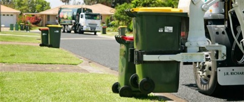 Yellow bin being collected